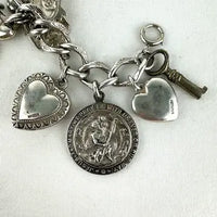 Amazing Vintage Charm Bracelet with Puffy Hearts, Native Charms and Religious Charms