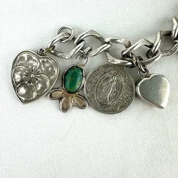 Amazing Vintage Charm Bracelet with Puffy Hearts, Native Charms and Religious Charms