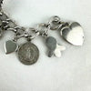 Amazing Vintage Charm Bracelet with Puffy Hearts, Native Charms and Religious Charms