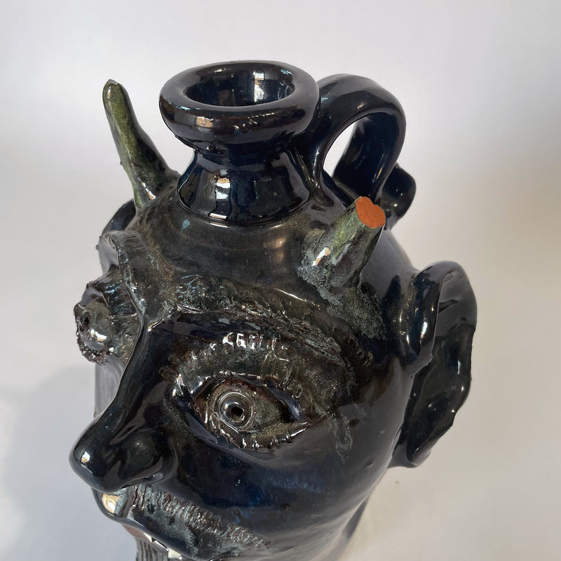 Folk art face jug by Bobby Ferguson