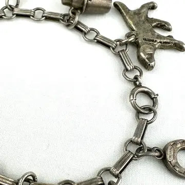 Vintage Silver Charm Bracelet with 12 Charms