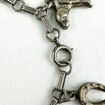 Vintage Silver Charm Bracelet with 12 Charms